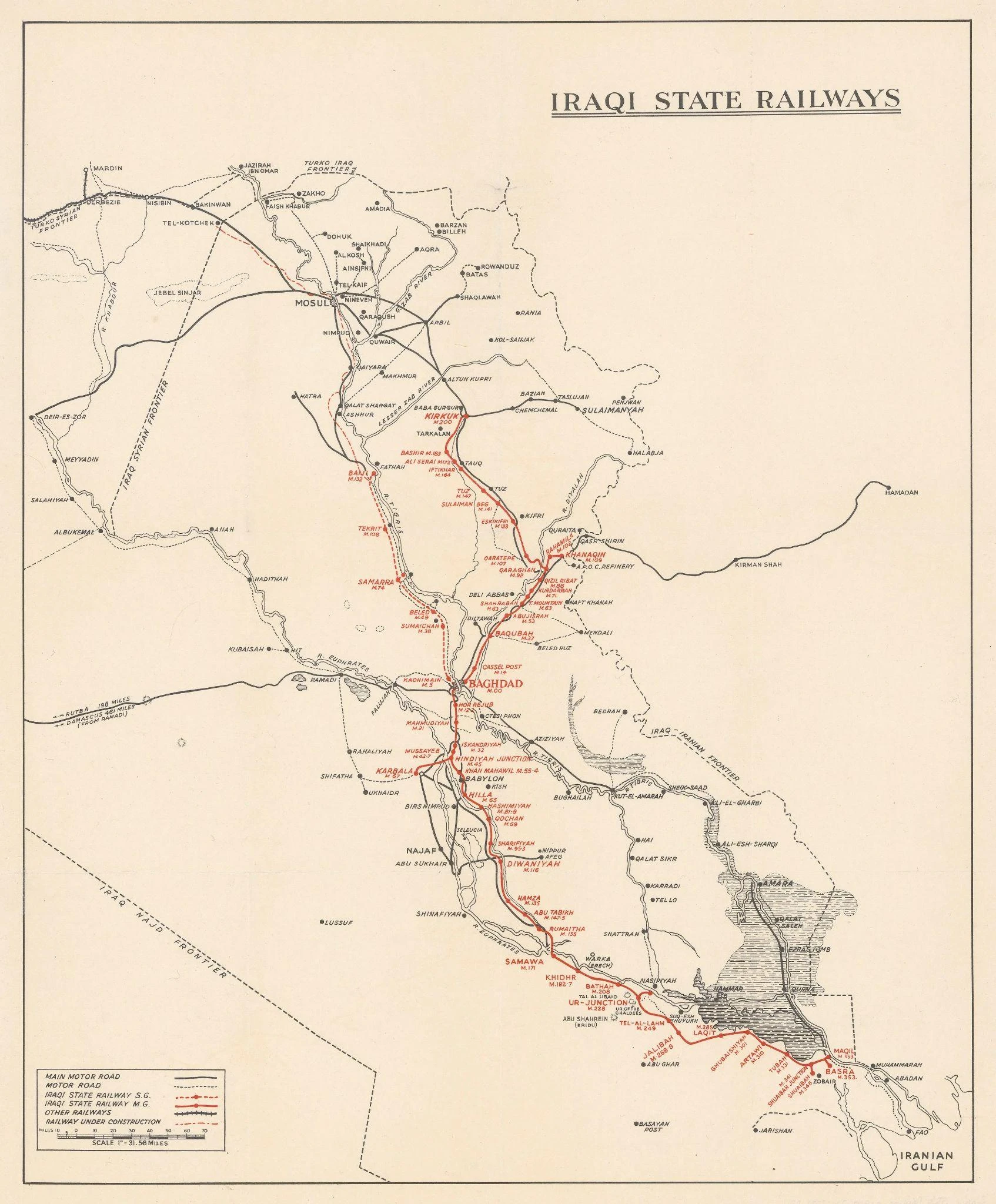 Figure 7 — Iraqi State Railways, c. 1950. Red lines distinguish existing metre- and standard-gauge railway from projected lines; black lines show roads. This historical map does not establish a current Iran-to-Mediterranean through railway or 2026 operating capacity. Source: Iraqi State Railways, via The Map House.